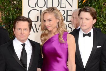 2013年金球奖红毯上和妻子、儿子