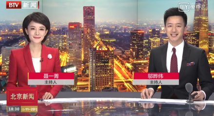 邬晔纬（右）