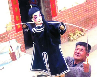 民间艺人表演汉调恍恍