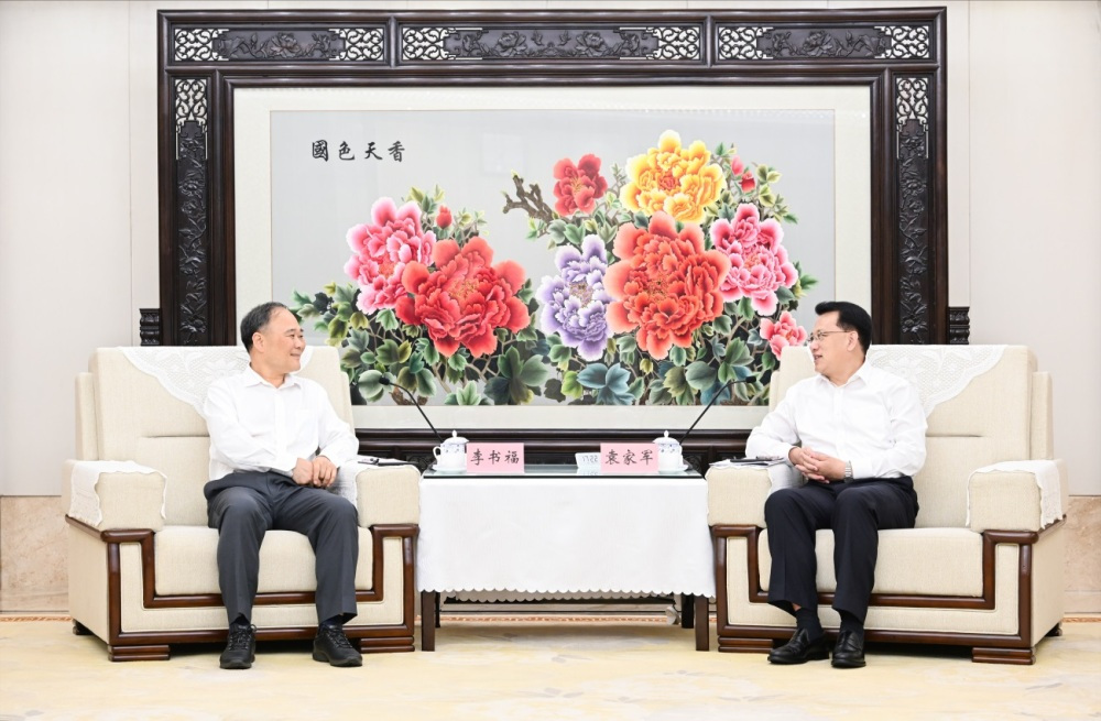 重庆市委书记袁家军会见吉利控股集团董事长李书福 