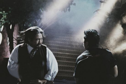《杀破狼》中饰演王宝，洪金宝在左1 