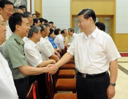 习近平在北戴河会见暑期休假活动专家