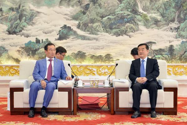 张庆伟会见尼古拉耶夫