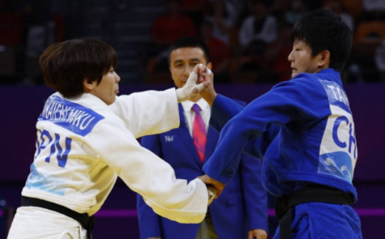 唐婧在杭州亚运会女子63公斤级柔道比赛中