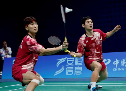 崔率圭（右）/金元浩在杭州第19届亚运会比赛中 